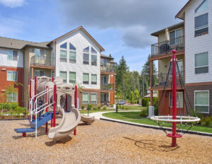 Outdoor playground at The Lodge Apartments at Marysville, WA.