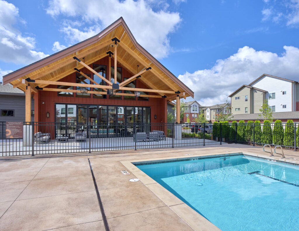 Fenced-in pool area at The Lodge Apartments at Marysville, WA.
