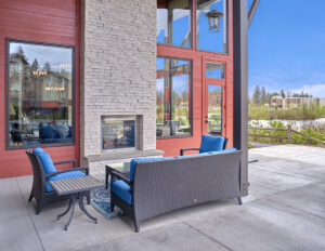 Outdoor fit pit with a view of the lake for residents at The Lodge at Marysville, WA.
